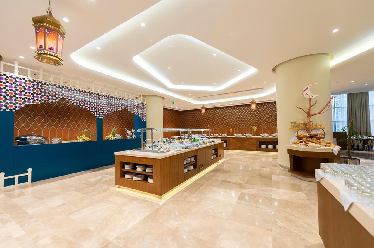 Holiday Suites Al Azizia Mecca Екстер'єр фото The hotel's restaurant