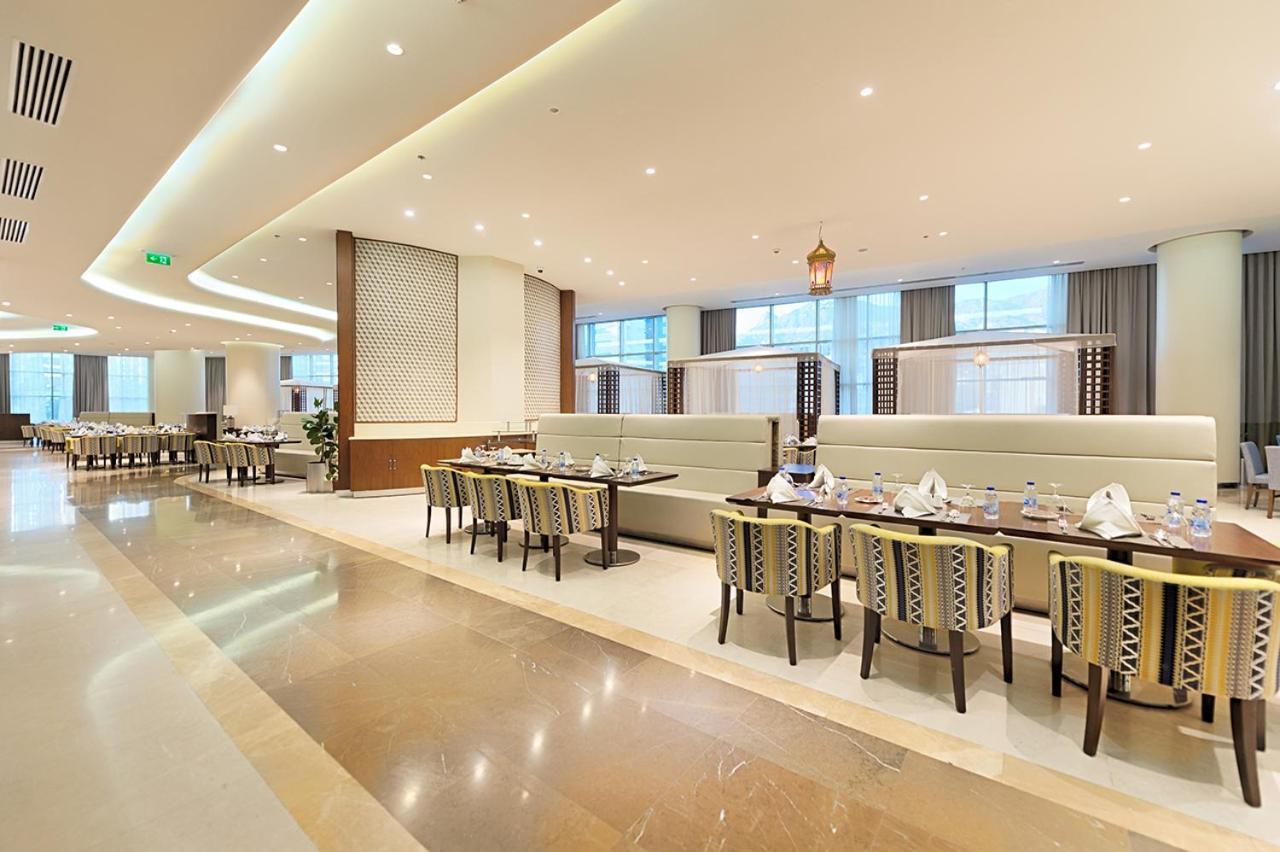 Holiday Suites Al Azizia Mecca Екстер'єр фото The hotel's restaurant