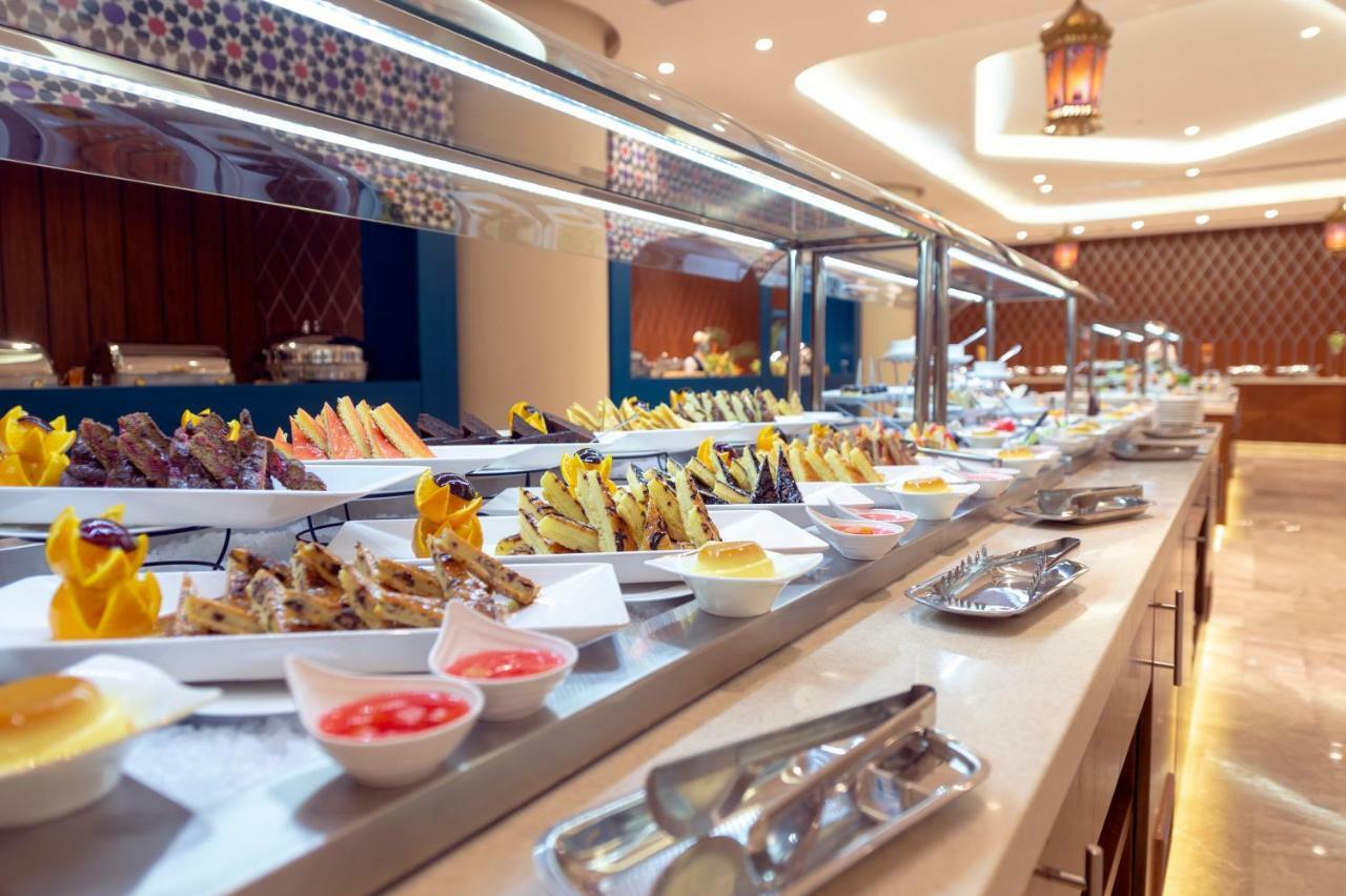 Holiday Suites Al Azizia Mecca Екстер'єр фото Buffet at the hotel